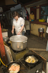 Puerto Montt, Llanquihue Province, Los Lagos Region, Chile: preparing food at the Fish Market - frying and boiling - photo by D.Smith