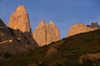 Torres del Paine National Park, Magallanes region, Chile: sunrise on the Towers of Paine - vertical granite pillars - Chilean Patagonia - photo by C.Lovell