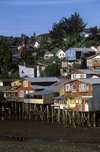 Castro, Chilo island, Los Lagos Region, Chile: palafitos, picturesque shingled houses on stilts  low tide on the fjord - photo by C.Lovell