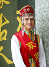 China - Hainan Island: greeter at Hainan Airlines office -  oddly she's wearing traditional Mongolian clothing (photo by G.Friedman)