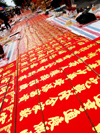 China - Hainan Island: red banners for sale - Chinese New year - Spring Festival (photo by G.Friedman)