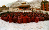 Xiahe county, Gannan Tibetan Autonomous Prefecture, Gansu province, China: Labrang Monastery - religious ceremony - monks in the snow - Geluk (Yellow Hat) school of Tibetan Buddhism - photo by Y.Xu