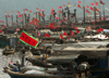 China - Hainan Island: boat flag chaos (photo by G.Friedman)