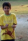 36 Christmas Island: Red Crab held by Malay boy (photo by B.Cain)