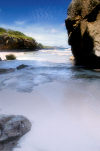 Christmas Island: Greta Beach sand and boulders (photo by Bill Cain)