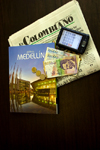 Medelln, Colombia: a traveller's accessories - Meddlln guide, PDA, Colombian Pesos, El Colombiano newspaper - photo by E.Estrada