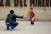 Zipaquir, department of Cundinamarca, Colombia: a father offers his daughter a hug - Miner's square - Plaza del Minero - photo by E.Estrada