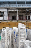 Moroni, Grande Comore / Ngazidja, Comoros islands: chairs left from a wedding - shops on Place de Badjanani - photo by M.Torres