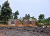 Goma, Nord-Kivu, Democratic Republic of the Congo: ruins of a house caught in the lava flow from the 2002 eruption of the Nyiragongo volcano - photo by M.Torres