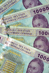 Brazzaville, Congo: Central African CFA Franc bank notes issued by the BEAC (Banque des tats de l'Afrique Centrale, Bank of the Central African States) - currency of the Economic and Monetary Community of Central Africa (Cameroon, Central African Republic, Chad, Republic of the Congo, Equatorial Guinea and Gabon) - 10000 Francs obverse, BEAC building (Yaound) and woman -  photo by M.Torres