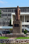Brazzaville, Congo:  statue of the first Congolese President Fulbert Youlou, dressed in a cassock, in front of the the City Hall - Htel de Ville / Mairie - architect Jean Yves Normand - Avenue Amilcar Cabral, Quartier de la Plain, Poto-Poto - photo by M.Torres