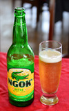 Brazzaville, Congo: Ngok' beer - bottle and glass of the famous Congolese brew - photo by M.Torres