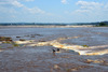 Djou, Congo: Livingstone Falls / Chutes du Djou - boys bathe in the rapids on the lower course of the Congo River, border between the Congos - photo by M.Torres
