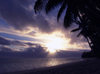 Cook Islands - Rarotonga island: sun begins to set over Titikaveka beach - photo by B.Goode