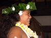 Cook Islands - Aitutaki island: island night at Pacific resort - woman with flower collar (photo by Ben Goode)