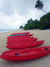 Cook Islands - Aitutaki island: kayaks on the beach - resort scene - photo by B.Goode