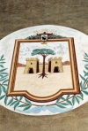 Corsica - Saint Florent: coat of arms painted on a building (photo by M.Torres)