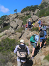 Corsica -  Bavella (Corse du Sud): hikers on a hilside - climbing (photo by J.Kaman)