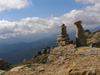 Corsica -  Bavella (Corse du Sud): piles of stones (photo by J.Kaman)