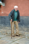 Croatia - Cakovec: elderly man with a cane - photo by P.Gustafson
