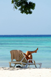 Cuba - Guardalavaca - Relaxing by beach with tree at top - Every travel brochure can use this image. It represents travel, relaxation, and a leisurely lifestyle - photo by G.Friedman