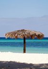 Cuba - Guardalavaca - thatched umbrella on a Caribbean beach - white sandy beach - photo by G.Friedman