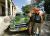 Cuba - Holgun - Green Chevy and young owners - photo by G.Friedman