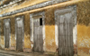 Cuba - Holgun - wall and four doors - photo by G.Friedman