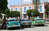 Cuba - Holgun - three old cars - photo by G.Friedman