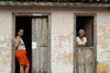 Cuba - Holgun - two women, two doors - photo by G.Friedman
