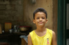 Cuba - Holgun province - boy in yellow shirt - photo by G.Friedman