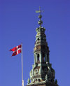 Denmark - Copenhagen / Kbenhavn / CPH: Parliament Tower and Danish flag - photo by G.Friedman