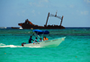 Punta Cana, Dominican Republic: sea taxi and the Astron Shipwreck - Arena Gorda Beach - photo by M.Torres