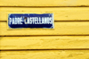 Puerto Plata, Dominican republic: street sign on yellow wall - Calle Padre Castellanos - photo by M.Torres