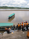 Ecuadorian Amazonia: tourists in lifejackets board their boat - Pastaza River (photo by Rod Eime)
