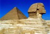 Egypt - Giza: the sphinx - Great Pyramid in background - archeology - history - Ancient Egypt (photo by J.Kaman)