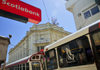 San Salvador, El Salvador, Central America: telecom building and buses on Calle Arce - Scotiabank sign - photo by M.Torres