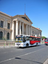 San Salvador, El Salvador, Central America: National Palace and passing bus - Plaza Barrios - photo by M.Torres