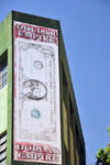 San Salvador, El Salvador, Central America: Dollar empire shop - giant one dollar bill at 6a calle poniente - photo by M.Torres