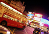 London: Piccadilly circus - Routemaster bus at night - photo by K.White