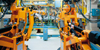 Cowley, Oxfordshire, South East England: robots in a car factory - German KUKA Industrial robots - Industrial Robotics in car production - photo by A.Bartel
