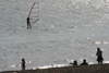 Gosport, Hampshire, South East England, UK: view from the beach with windsurfers in background - photo by I.Middleton