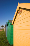 Calshot, Solent, Hampshire, South East England, UK: line of colourful beach huts - photo by I.Middleton