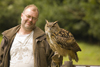 Exmoor NP, Somerset, South West England, UK: visitor with great horned owl at Exmoor Falconry - photo by I.Middleton
