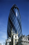 London, England: Swiss RE building, the Gherkin - 30 St Mary Axe - built by Skanska - St Andrew Undershaft Church at the bottom - photo by A.Bartel