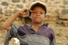 Eritrea - Mendefera, Southern region: a poor child soldier stands to attention - photo by E.Petitalot