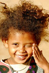 Eritrea - Mendefera, Southern region: a smilling girl - photo by E.Petitalot