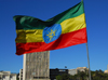 Addis Ababa, Ethiopia: Ethiopian flag and Bank of Abyssinia - Meskal square - photo by M.Torres