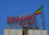 Addis Ababa, Ethiopia: Ethiopian Airlines ad atop the Bank of Abyssinia building - Meskal square - photo by M.Torres