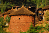 Lalibela, Amhara region, Ethiopia: cylindrical huts with thatched roofs - photo by M.Torres